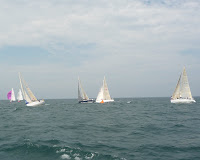 Zukasky Regatta 2009 / Tsunami leading the second wave around the last windward mark of the second race.  Collaboration rounding the mark with inside rights on Mojo (dark hull).  Cancan to the right.