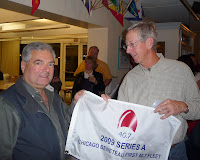 Fall Fleet Fling and skippers' meeting / Tom Weber (right) with 1st place Series A award