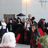 This vampire family looked great. I think that is a little freaky co-joined undead twins doll she's holding.