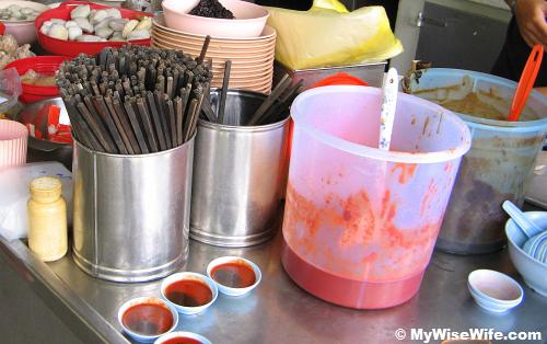Sweet sauce is in black and Spicy is in red - both are a must! Sweet sauce is in black and Spicy is in red - both are a must!