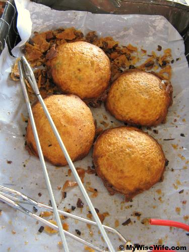 Golden brown prawn fritters ready to serve