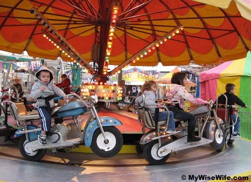 Mommy..see, I could lift my hands on motorbike! Mommy..see, I could lift my hands on motorbike!