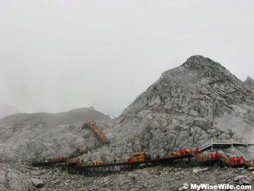 The peak was covered by mist and bad weather The peak was covered by mist and bad weather