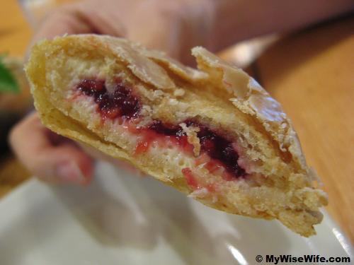 Glazed with cheese and raspberry wrapped inside makes me drooling...