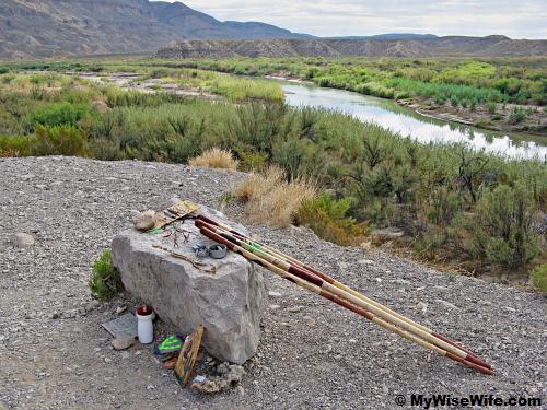 Foreground: Souveniars from Mexico; Background: Rio Grande River and land of Mexico Foreground: Souveniars from Mexico; Background: Rio Grande River and land of Mexico