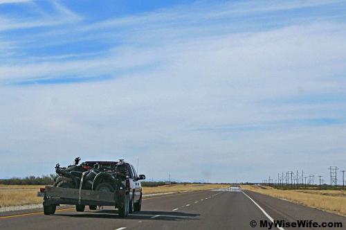 ATVs (All-Terrain-Vehicles) on the wagon - captured along IH-10 ATVs (All-Terrain-Vehicles) on the wagon - captured along IH-10