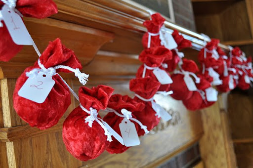 advent calendar hanging on mantel
