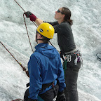Me preparing to climb with Betsy belaying