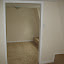 Attic, right of the stairs.