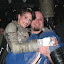 Dan picking up Amanda. Cropped.