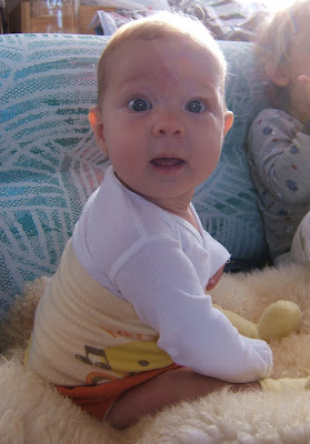 Aurora Miranda sitting up by herself