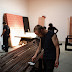 Abe Dolinger (center) puts another coat of stain on our wainscoting
