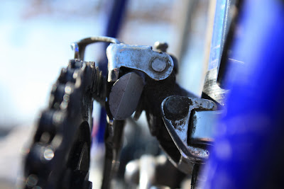 A washer and seatpost piece is wedged in there