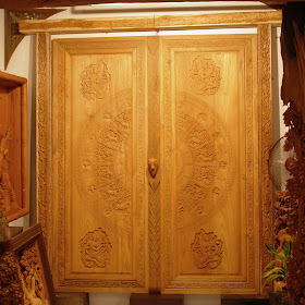 wood carved front doors for reference - Kerala home