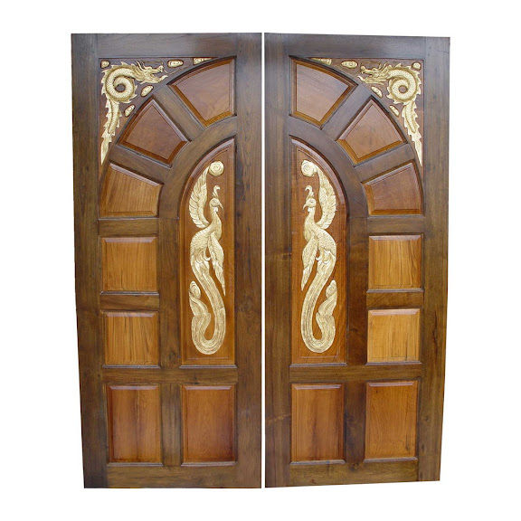 wood carved front doors for reference - Kerala home