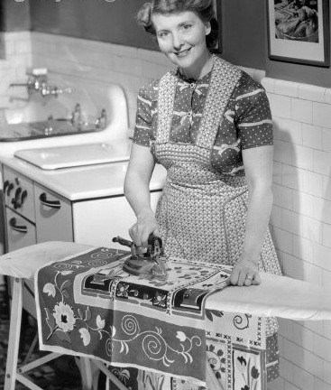 [woman ironing in kitchen[2].jpg]