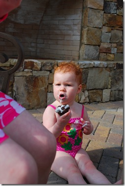 yes, that's icing on my bathing suit...i dropped the cupcake on my belly!