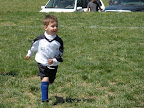 Joshua runs after the ball