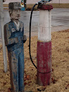 Carved Gas Man & Pump