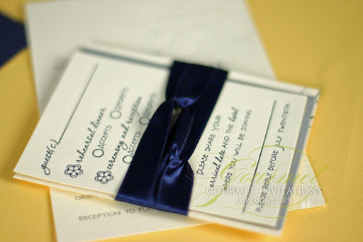 The inserts were bound together with lots of twisting navy blue ribbon
