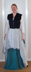 The finished dress, with the skirt tucked up in front.
