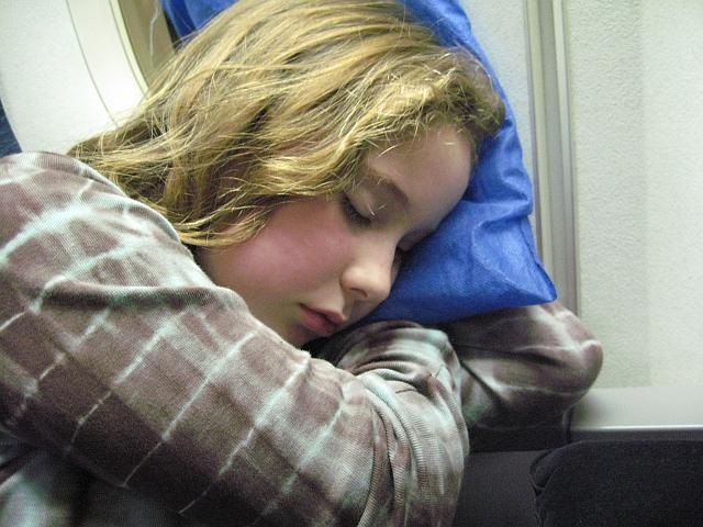 [091225_elena_sleeping_on_plane_sm[2].jpg]