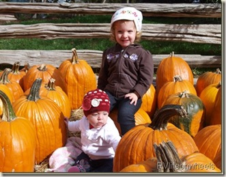 emmie and paige with pumpkins