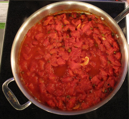 This is the tomato sauce flavored with garlic, capers, red pepper flakes, salt and pepper.