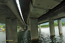 The under side or under section of a bridge crossing Lake Lucerne - heavy pillars in the water - Thumbnail