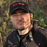 Shooting is serious stuff. You need a random hat, earplugs, glasses, and a weird facial expression.