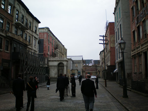 a group of people walking down a street