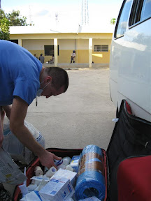 Darren sorting out donated supplies to take to the surgery area of the hospital.