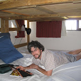 Andy relaxing on our spacious bed.