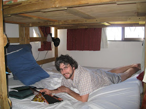 Andy relaxing on our spacious bed.