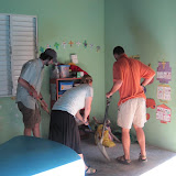 Andy, Robin and Charlie chase a mouse before school.