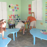 That's Kim on the table as the boys go after the mouse.