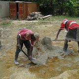 Step 5: Shovel the sand and cement into a pile
