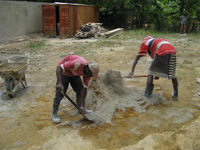 Step 5: Shovel the sand and cement into a pile