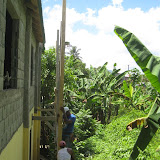 Making scaffolding to be able to plaster the back side of the school.