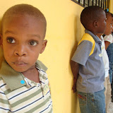 Peter, one of our newest 3 year olds, with his class behind him.