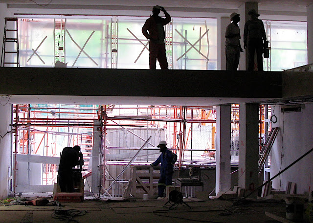 Behind the scenes at Mint. In the background you can see the floor to ceiling glass façade that opens onto St Georges Mall. 