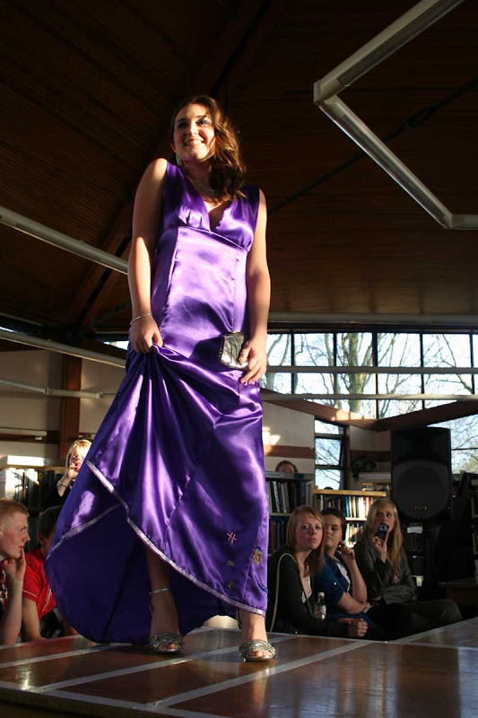 Amy model her long slinky gown inspired by romantic novels