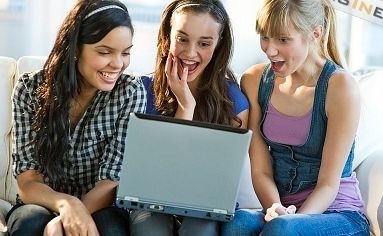 [woman laughing - looking at laptop[14].jpg]