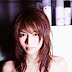 釈由美子