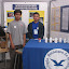 Stand del Colegio Francisco de Miranda con su proyecto "Construcción de un telescopio Reflector".