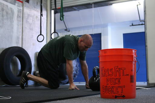 The KrisFit Bucket inched closer and closer to Kevin.  Taunting him.  Daring him for one more rep.