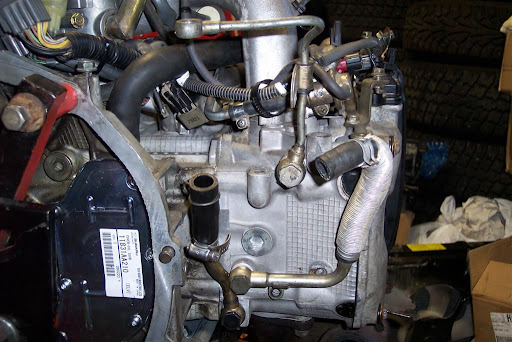 Coolant In Oil. The oil return is a TD04