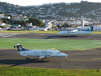 A Beech 1900D (taxiway) and ATR72 (runway) at the northern end of Wellington airport