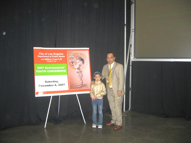 The Artist and granddaughter Mia(The Model for the drawing)