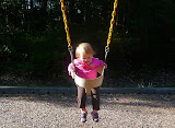 She loves the swings!